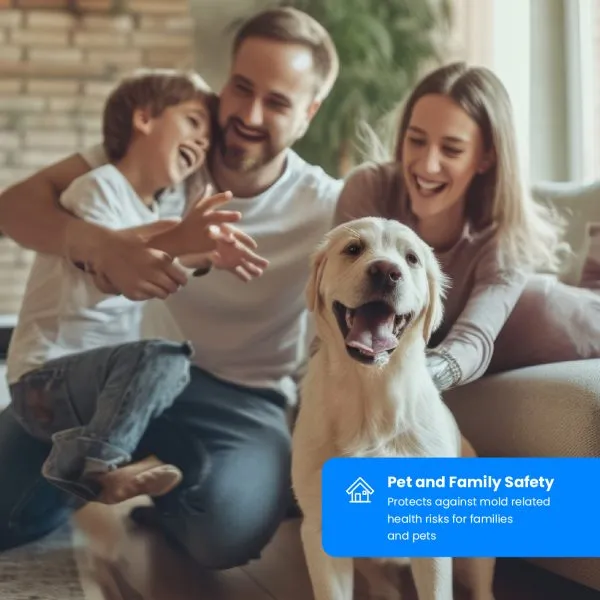 Smiling family and golden retriever indoors